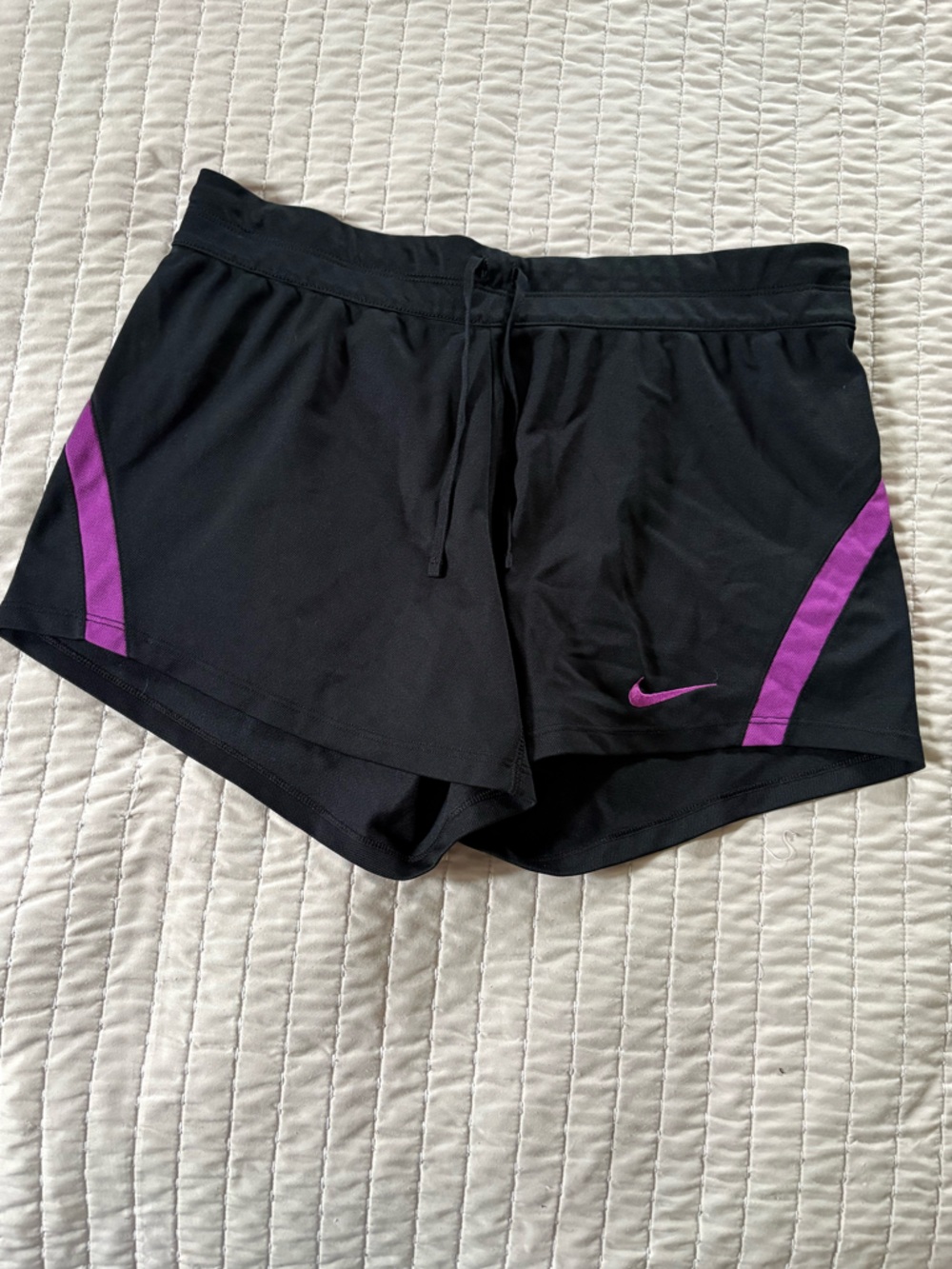 Nike Women's Black Athletic Shorts with Purple Accents